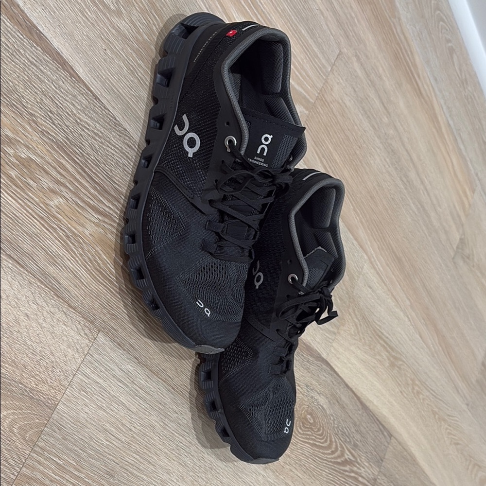 On Running Black Athletic Shoes with Breathable Mesh and Thick Rubber Sole